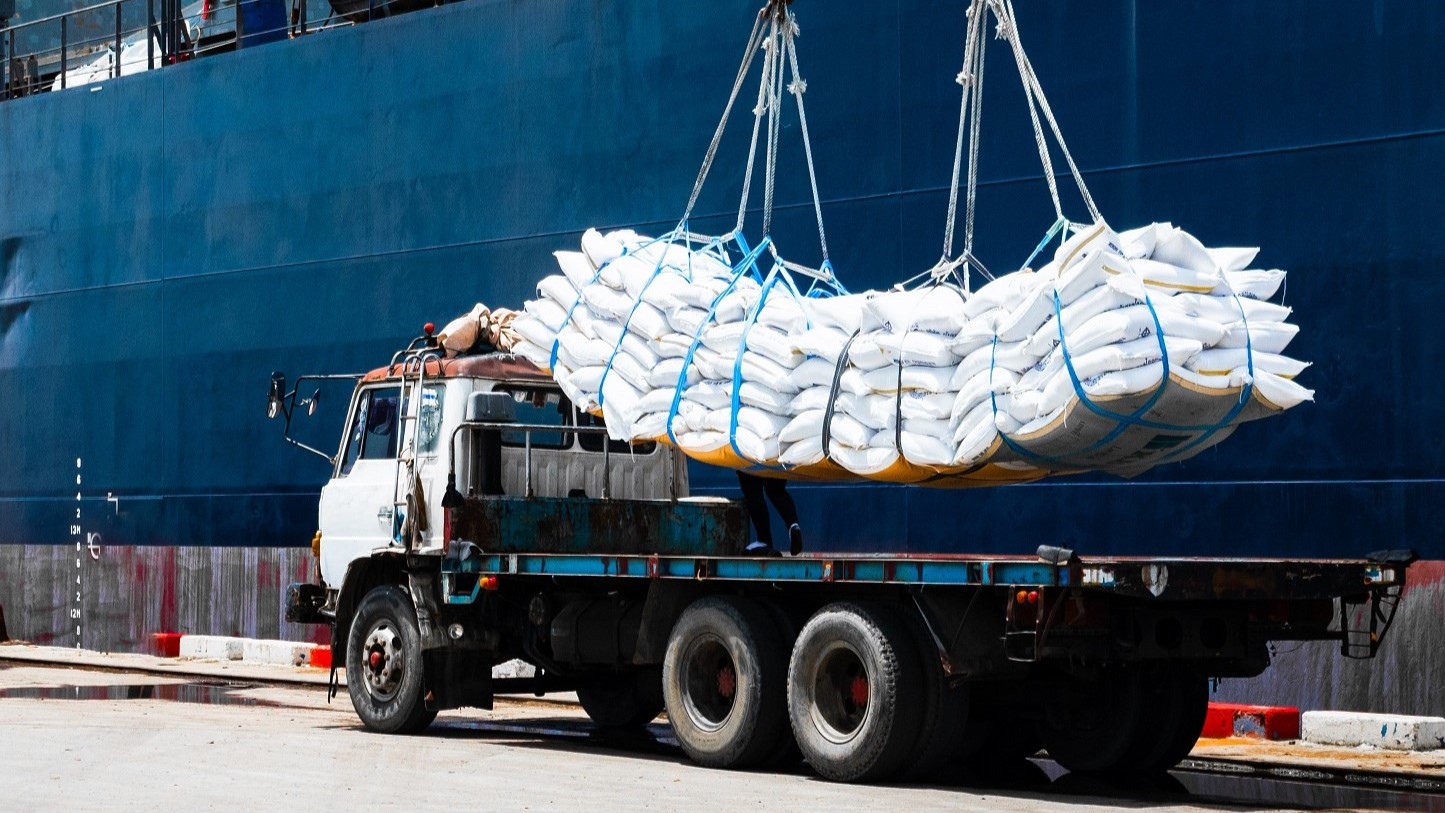 Ship offloading cargo